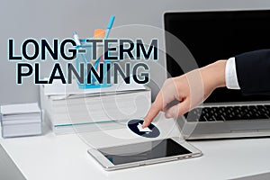 Handwriting text Long Term PlanningEstablish Expected Goals five or more years ahead. Business concept Establish