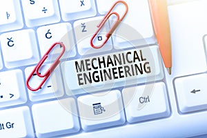 Handwriting text Mechanical Engineering. Concept meaning deals with Design Manufacture Use of Machines Abstract Typing