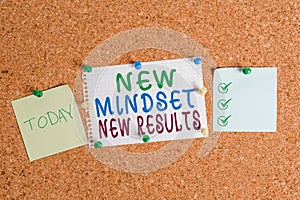 Handwriting text New Mindset New Results. Concept meaning Open to Opportunities No Limits Think Bigger Corkboard color