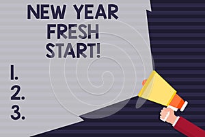 Handwriting text New Year Fresh Start. Concept meaning Time to follow resolutions reach out dream job Hand Holding