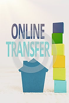 Handwriting text Online Transfer. Business showcase authorizes a fund transfer over an electronic funds transfer photo