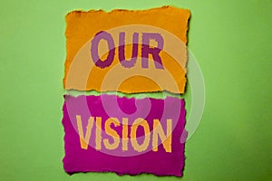 Handwriting text Our Vision. Concept meaning Innovation Strategy Mission Goal Plan Dream Aim Direction written on Tear Papers on t