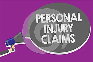 Handwriting text Personal Injury Claims. Concept meaning being hurt or injured inside work environment Man holding megaphone louds