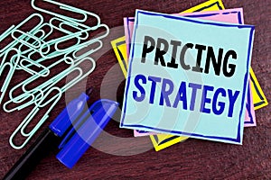 Handwriting text Pricing Strategy. Concept meaning Marketing sales strategies profit promotion campaign written on Sticky Note Pap
