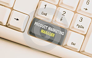 Handwriting text Product Marketing Manager. Concept meaning who responsible for putting plan to sell product White pc