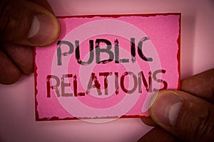 Handwriting text Public Relations. Concept meaning Communication Media People Information Publicity Social Words written pink pape