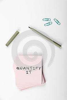 Handwriting text Quantify It. Conceptual photo Measure the size or amount of something and express in numbers photo