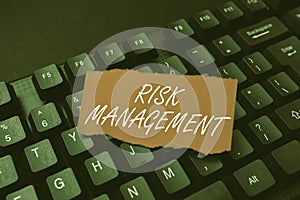 Handwriting text Risk Management. Business approach assessing and controlling future threats to the business Retyping