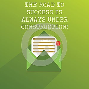Handwriting text The Road To Success Is Always Under Construction. Concept meaning In continuous improvement Open Message Envelope