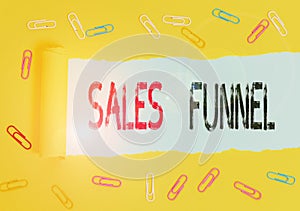 Handwriting text Sales Funnel. Concept meaning process through which a company ells its products to buyers.