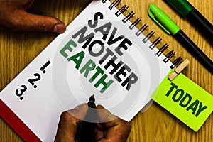 Handwriting text Save Mother Earth. Concept meaning doing small actions prevent wasting water heat energy Diary pen notepad ring p