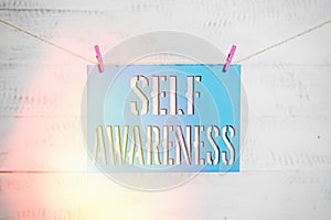 Handwriting text Self Awareness. Concept meaning Consciousness of an individual towards a situation or happenings Clothesline