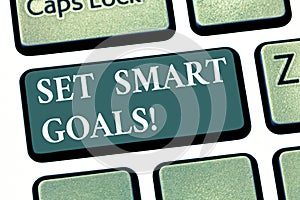 Handwriting text Set Smart Goals. Concept meaning Establish achievable objectives Make good business plans Keyboard key