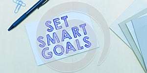 Handwriting text Set Smart Goals. Internet Concept Establish achievable objectives Make good business plans