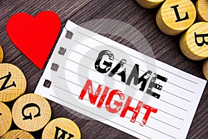 Handwriting text showing Game Night. Conceptual photo Entertainment Fun Play Time Event For Gaming written on tear note paper stic