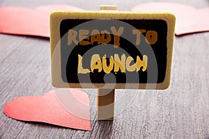 Handwriting text showing Ready To Launch. Business photo showcasing Prepare New Product Promotion Start Release written on blackbo