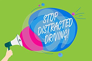 Handwriting text Stop Distracted Driving. Concept meaning asking to be careful behind wheel drive slowly Man holding Megaphone lou