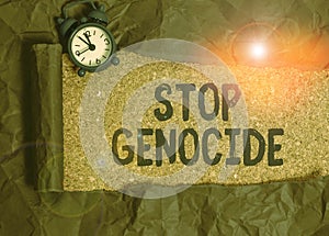 Handwriting text Stop Genocide. Concept meaning to put an end on the killings and atrocities of showing photo