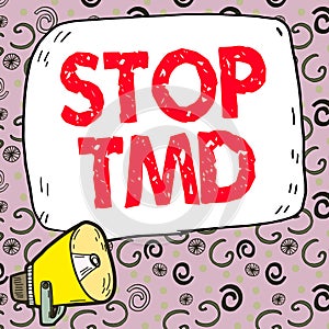 Handwriting text Stop Tmd. Word Written on Prevent the disorder or problem affecting the chewing muscles photo