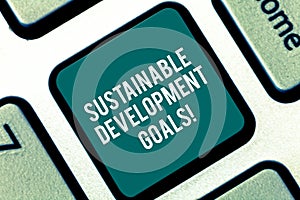 Handwriting text Sustainable Development Goals. Concept meaning Unite Nations Global vision for huanalysisity Keyboard