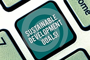 Handwriting text Sustainable Development Goals. Concept meaning Unite Nations Global vision for huanalysisity Keyboard photo