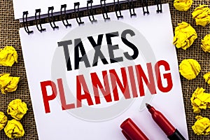 Handwriting text Taxes Planning. Concept meaning Financial Planification Taxation Business Payments Prepared written on Notebook