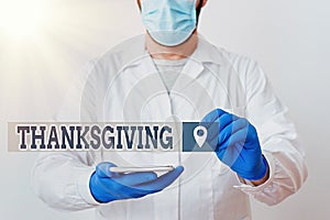 Handwriting text Thanksgiving. Concept meaning public acknowledgment or celebration of divine goodness Laboratory