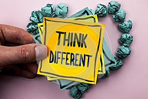 Handwriting text Think Different. Concept meaning Rethink Change on vision Acquire New Ideas Innovate written on Sticky Note Paper