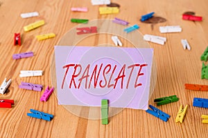 Handwriting text Translate. Concept meaning Another word with same equivalent meaning of a target language Colored photo