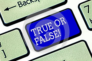 Handwriting text True Or False. Concept meaning Decide between a fact or telling a lie Doubt confusion Keyboard key