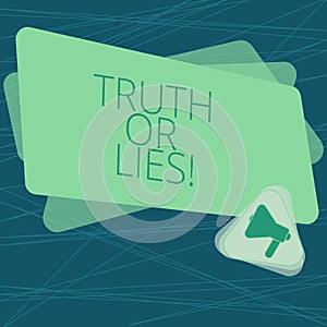 Handwriting text Truth Or Lies. Concept meaning Decide between a fact or telling a lie Doubt confusion Megaphone Inside