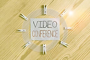 Handwriting text Video Conference. Concept meaning showing in remote places hold facetoface meetings Colored clothespin papers