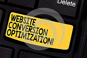 Handwriting text Website Conversion Optimization. Concept meaning System for increasing website visitors Keyboard key