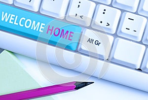Handwriting text Welcome Home. Concept meaning Expression Greetings New Owners Domicile Doormat Entry White pc keyboard