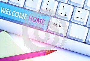 Handwriting text Welcome Home. Concept meaning Expression Greetings New Owners Domicile Doormat Entry White pc keyboard