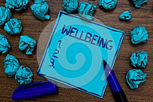 Handwriting text Wellbeing. Concept meaning Healthy lifestyle conditions of people life work balance Cyan paper imagination idea t