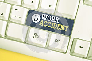 Handwriting text Work Accident. Concept meaning Mistake Injury happened in the job place Getting hurt White pc keyboard