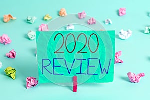 Handwriting text writing 2020 Review. Concept meaning seeing important events or actions that made previous year Colored