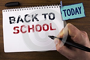 Handwriting text writing Back To School. Concept meaning Right time to purchase schoolbag, pen, book, stationary written by Man on