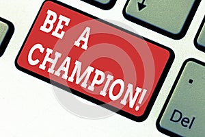 Handwriting text writing Be A Champion. Concept meaning Triumph in a competition sport the winner of a contest Keyboard