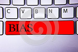 Handwriting text writing Bias. Concept meaning Unfair Subjective One-sidedness Preconception Inequality Bigotry Keyboard red key I