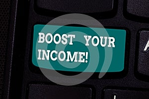 Handwriting text writing Boost Your Income. Concept meaning increase month or annual salary using part time job Keyboard