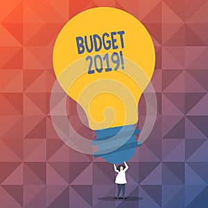 Handwriting text writing Budget 2019. Concept meaning estimate of income and expenditure for current year Person