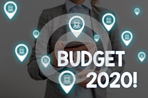 Handwriting text writing Budget 2020. Concept meaning estimate of income and expenditure for next or current year Woman