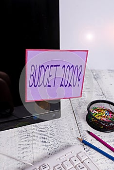 Handwriting text writing Budget 2020 Question. Concept meaning estimate of income and expenditure for next year Note