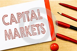 Handwriting text writing Capital Markets. Concept meaning Allow businesses to raise funds by providing market security