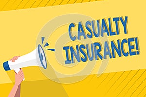 Handwriting text writing Casualty Insurance. Concept meaning overage against loss of property or other liabilities Human photo