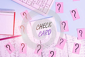 Handwriting text writing Check Card. Concept meaning allows an account holder to access funds in her account Writing