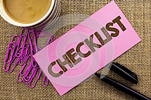 Handwriting text writing Checklist. Concept meaning Todolist List Plan Choice Report Feedback Data Questionnaire written on Pink S photo