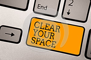 Handwriting text writing Clear Your Space. Concept meaning Clean office studio area Make it empty Refresh Reorganize Typing work c